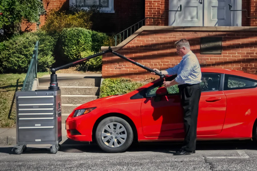 Darryl 3d scanning a car outdoor